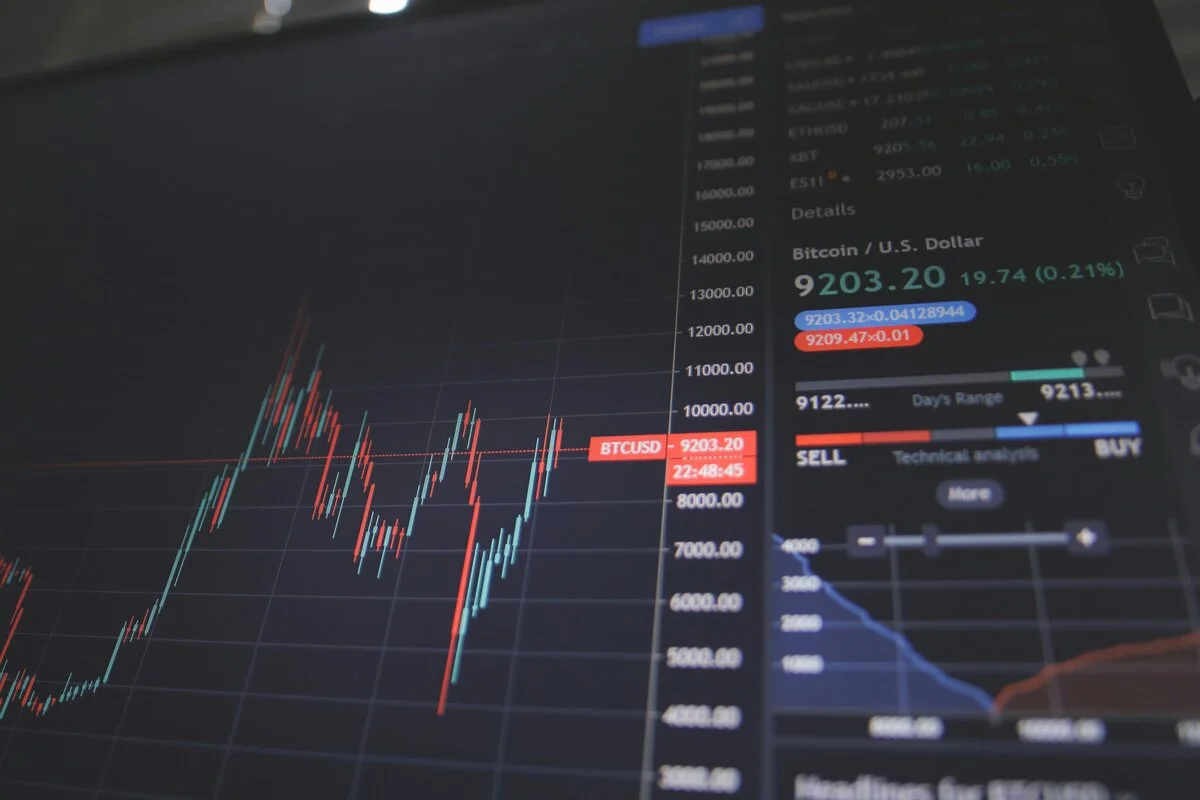Financial trader analyzing stock options charts with covered call strategy highlighted, representing passive income generation through options
